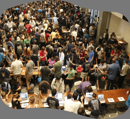 Aerial view of the packed Cal Hacks 2014 hacking floor